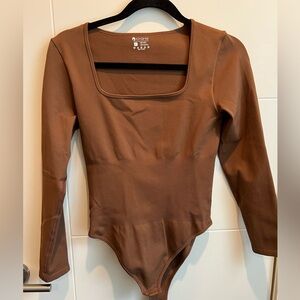 Amazon bodysuit - never worn - size L